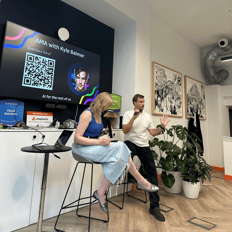 Kyle Balmer speaking on stage